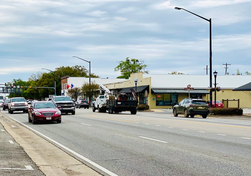 Vehicles move through the intersection of Orange Avenue and Alabama 59 in Foley. The city is working to develop a Safety Action Plan to reduce accidents and improve traffic flow in Foley.