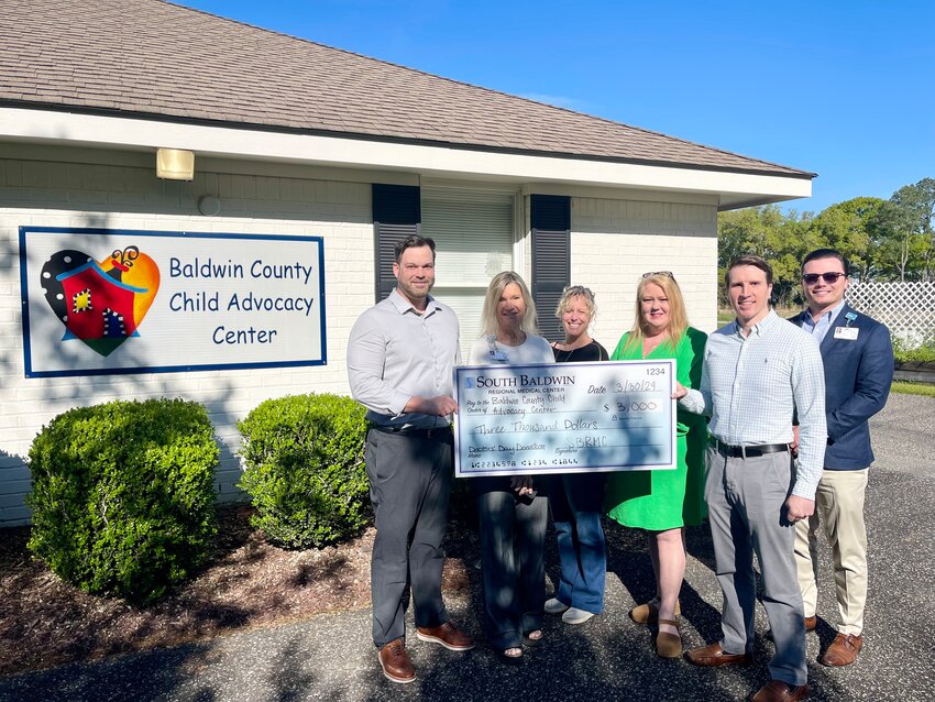 In observance of National Doctors' Day on March 30, South Baldwin Regional Medical Center chose to commemorate the occasion by making a charitable contribution in honor of their medical staff to the Baldwin County Child Advocacy Center.