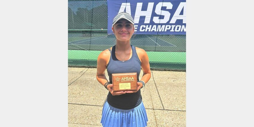 AHSAA Tennis Director Marvin Chou presents Gulf Shores freshman Tereza Mojs with her individual state championship plaque after she won the No. 1 singles bracket at the state tournament in Mobile on Tuesday. Mojs lost only one set in her five-match run to the championship.