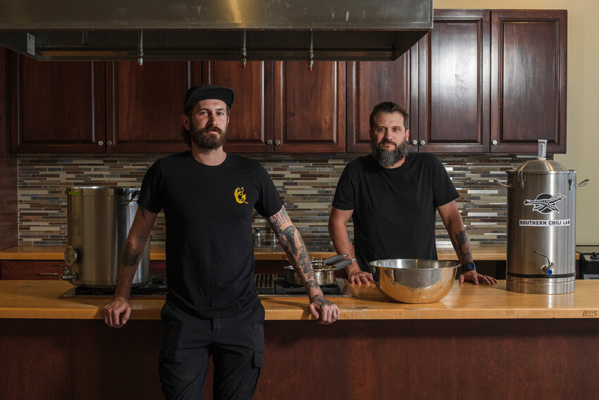 (From left) Tyler Braun and Jonathan Kastner, owners of Southern Chili Lab, at their newest venture centered around cooking classes at The Wharf.