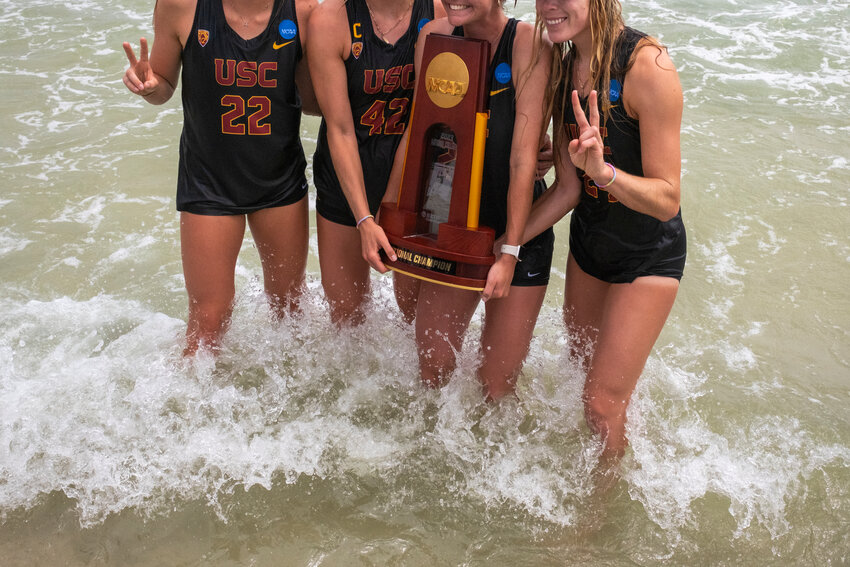 The USC Women of Troy celebrate their third consecutive national championship in the Alabama Gulf on May 7, 2023. Their title will be on the line next weekend when the NCAA Beach Volleyball National Championship takes over Gulf Place Beach for the eighth time.