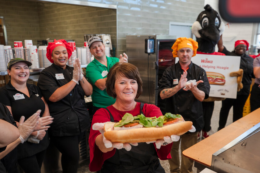 Fairhope Mayor Sherry Sullivan made the first Wawa Hoagie. Wondering what ingredients Sullivan added to the first hoagie? Wonder no longer. Sullivan chose American and Swiss cheese, garlic aioli, turkey, ham, tomato, banana peppers, pickles, spinach, salt and pepper and finished with oil and vinegar.