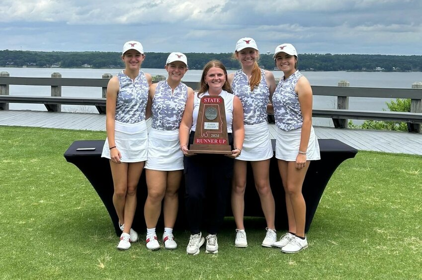 The Spanish Fort Toro girls’ golf team poses with a second consecutive Red Map trophy after their runner-up finish at the Class 6A State Championship in Florence on Tuesday, May 14. All four qualified golfers finished in the top 12 of the individual standings.