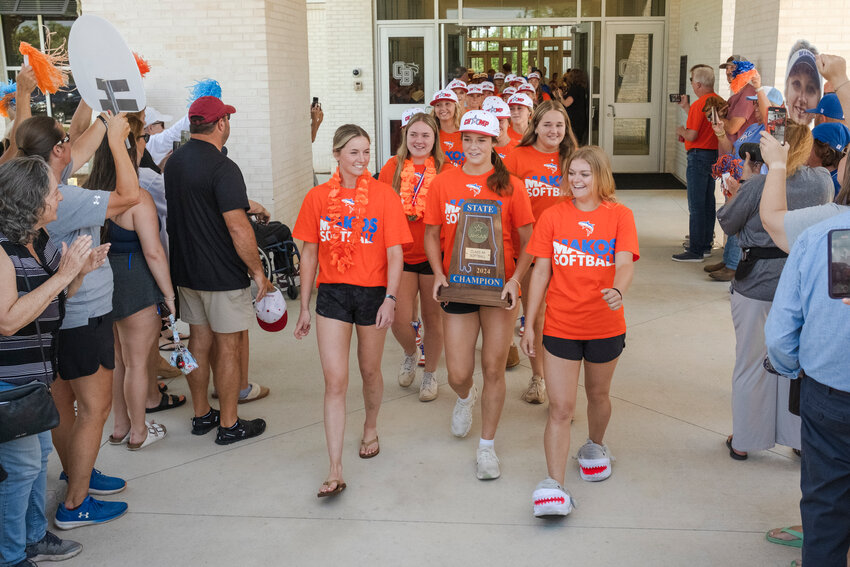 The Orange Beach Makos’ first stop back home on Wednesday, May 15, after claiming their fourth-straight AHSAA state softball championship was to walk through Orange Beach City Schools lined with fellow students, community members, parents and teachers. The Makos have been crowned queens of the diamond all four seasons they've been a varsity program and now sit only one spot behind Pisgah in the all-time state rankings for the most consecutive titles.