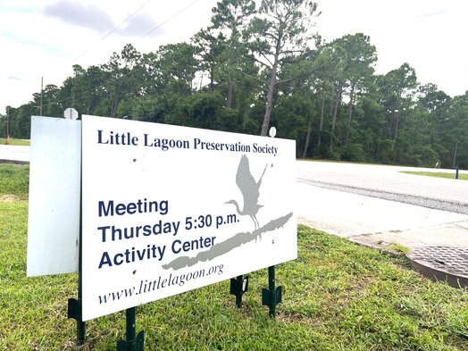 A sign with details concerning the Little Lagoon Preservation Society meeting found on the corner of Clubhouse Dr and W Second St, next to the location of the meeting.  RUTH MAYO / Gulf Coast Media