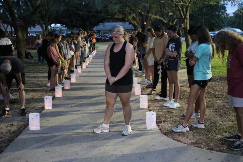 Community members gather during the 2023 Light in the Darkness Suicide Awareness Walk.