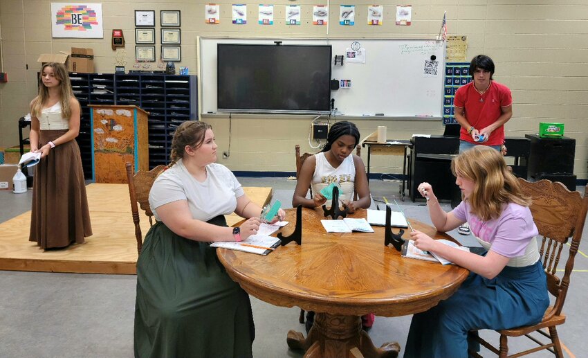 In the photo above, from left to right, are Allyson Funderburk as Margaret Leavitt, Addy Beaman as Williamina Fleming, Tinaya Prim as Annie Jump  Cannon, Addyson Newkirk as Henrietta Leavitt and Xander van den Nieuwenhof as Peter Shaw in Foley High School&rsquo;s production of &ldquo;Silent Sky.&rdquo;