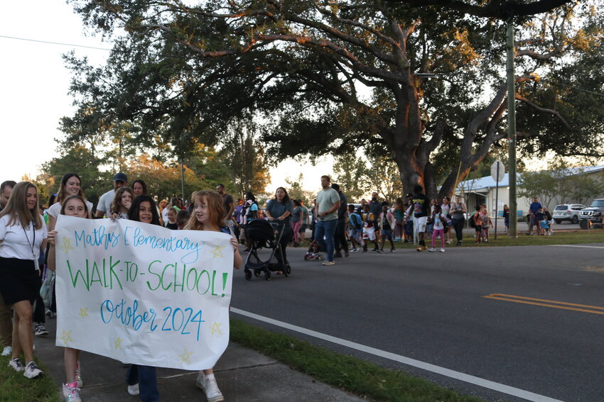 Students at Florence B. Mathis Elementary School were enthusiastic about walking to school alongside their parents and teachers on Oct. 2.