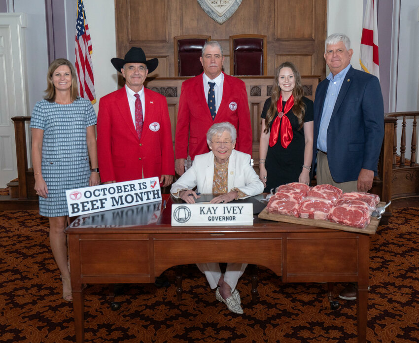 From left to right, ACA Executive Vice President Erin Beasley; ACA President Terry Slaten, Cullman County; ACA President-Elect Keith Glover, Hale County; ACA Director of Consumer Outreach Josie Jones; and Senate Agriculture, Conservation and Forestry Committee Chairman Sen. David Sessions pose with Gov. Kay Ivey after she signed the proclamation making October Beef Month official in the state of Alabama for 2024.