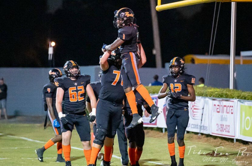 Baldwin County senior Ti Mims celebrates his short-yardage touchdown in the first half of the Tigers’ Class 6A Region 1 battle with the Murphy Panthers at Lyle Underwood Stadium on Friday, Oct. 11. Baldwin County went on to secure a 22-6 win for the first win of the Andrew Davis Era.