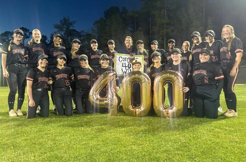 The Coastal Alabama-South Coyotes pose for a team photo following a doubleheader sweep of the Carl Sandburg Chargers from Illinois on Monday, March 11, which helped head softball coach Mallory Radwitch reach the 400-win milestone. A Daphne native and Coastal Alabama alumna, Radwitch is in her 12th year at the helm of the Coyote program where she has helped coach more than 50 National Fastpitch Coaches Association All-Region selections and led Coastal Alabama to its first-ever NJCAA District Championship berth in 2023.