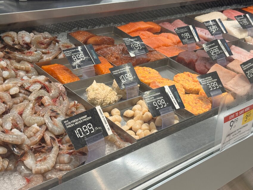The seafood department at Publix in Foley shows signage to adhere to the new Alabama Seafood Labeling Law.