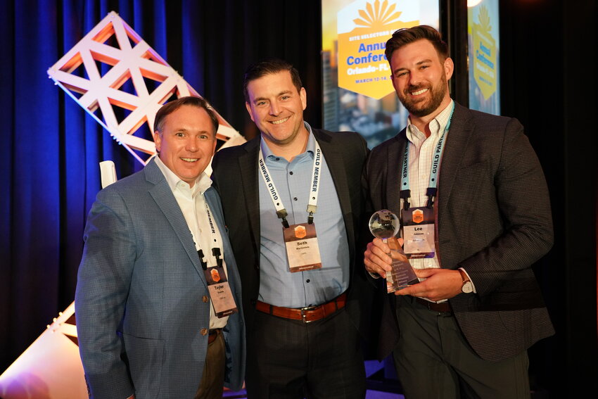 BCEDA Executive Vice President Lee Johnson (right) accepting Site Selectors Guild 2025 Project with a Purpose Award at the Site Selectors Guild Annual Conference in Orlando, Florida for Baldwin Preparatory Academy.