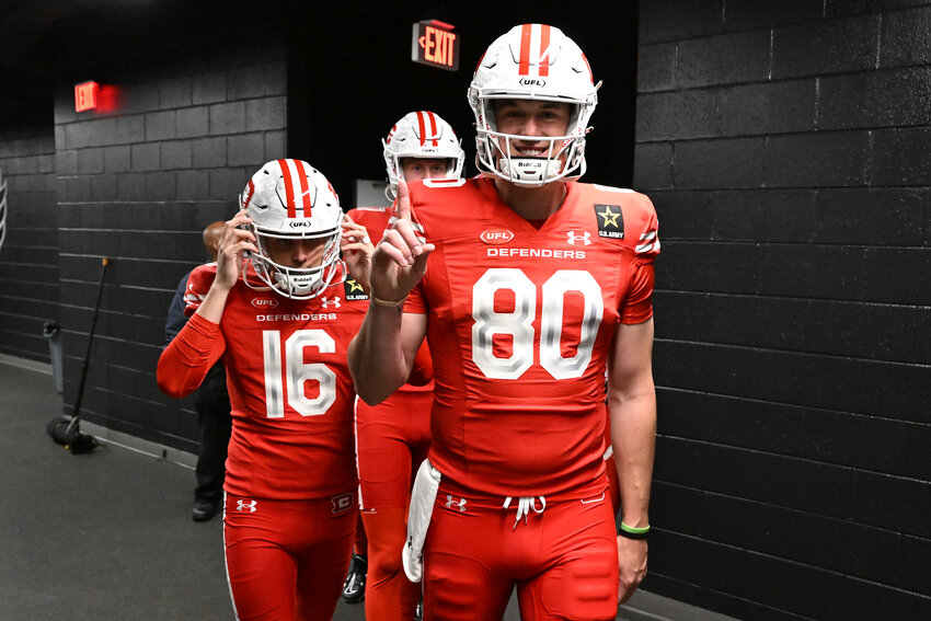 Spanish Fort alum Trae Barry emerges from the locker room before a D.C. Defenders home game at Audi Field in the nation&rsquo;s capital during last year&rsquo;s inaugural season of the United Football League. A former Jacksonville State Gamecock and Boston College Eagle, Barry is among the athletes who have capitalized on professional football dreams in the revitalized spring league.