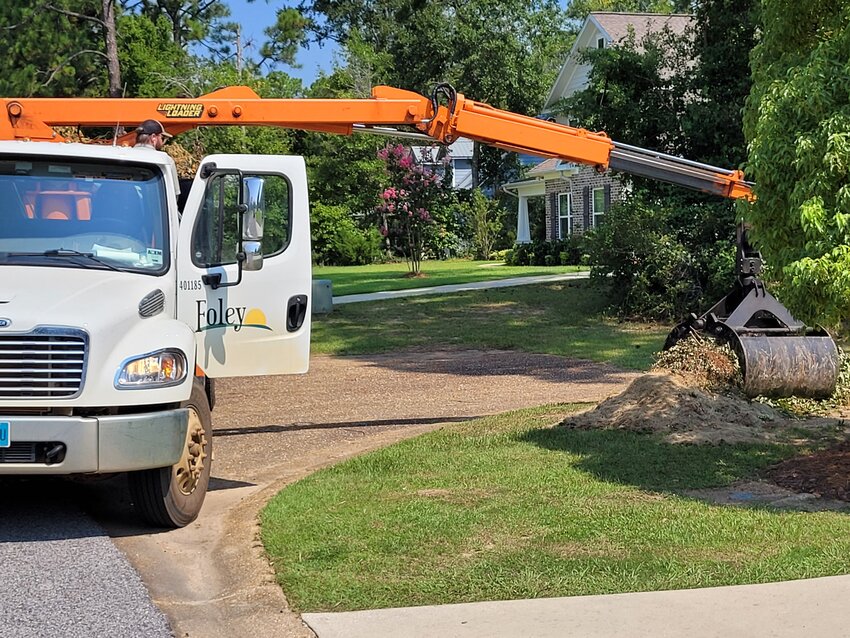 Foley city trucks collect limbs and yard debris from homes in the city. The city plans to add a fifth truck and expand collection service in the upcoming fiscal year.
