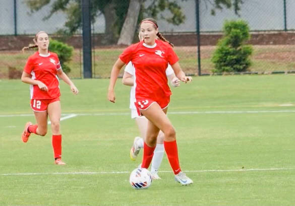 Carolina Callahan (15) scored the final of four goals for St. Michael Catholic girls' soccer on Wednesday, May 7, at John Hunt Park in Huntsville for their state semifinal matchup against Indian Springs. Abigail Smeraglia (24) scored the other three in the Cardinals' 4-1 win.