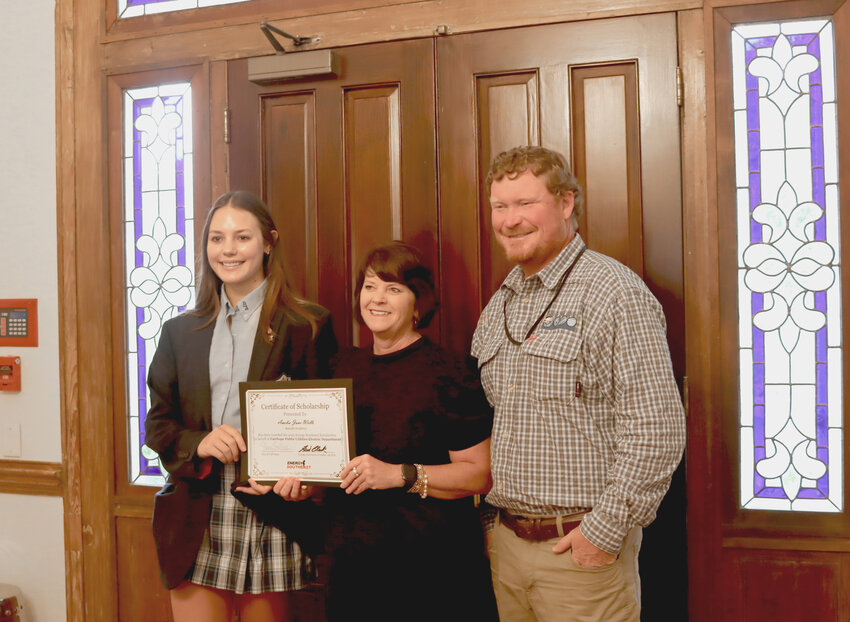 From left to right, Amelia Wells, Bayside Academy Senior, Mayor Sherry Sullivan and Ben Patterson, electric superintendent for Fairhope Public Utilities.