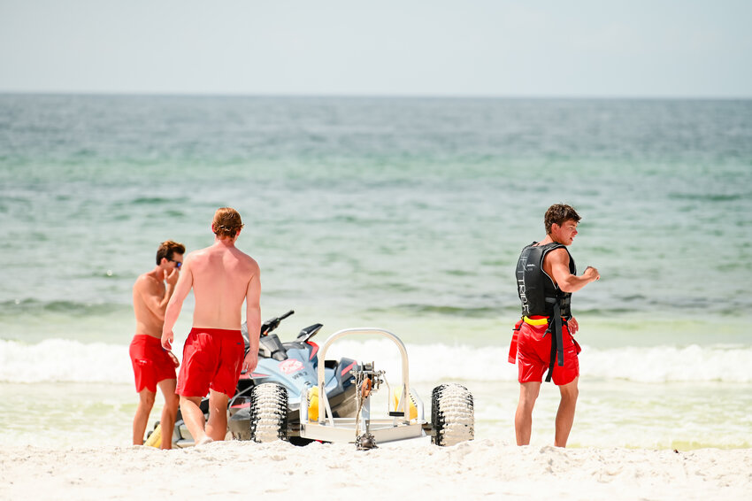 During the demonstration, a three-member crew simulated what a response to a conscious and unconscious swimmer in distress looks like.