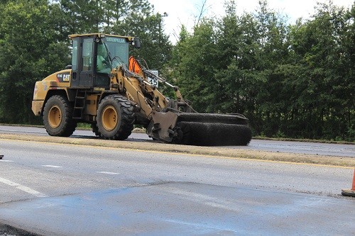 Crews with H.O. Weaver & Sons Inc. work on the resurfacing of U.S. Highway 90 near the intersection of Alabama 59 on Aug. 18. The project is set for completion by the end of Labor Day week.