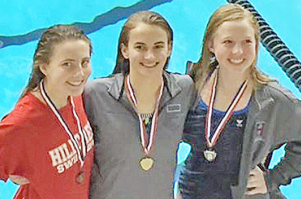 2016 state diving champion Emilie Hunter, (center) with runner-up Julia Keller of Huntsville, right and bronze medalist M'Kay Gidley of Hillcrest-Tuscaloosa.