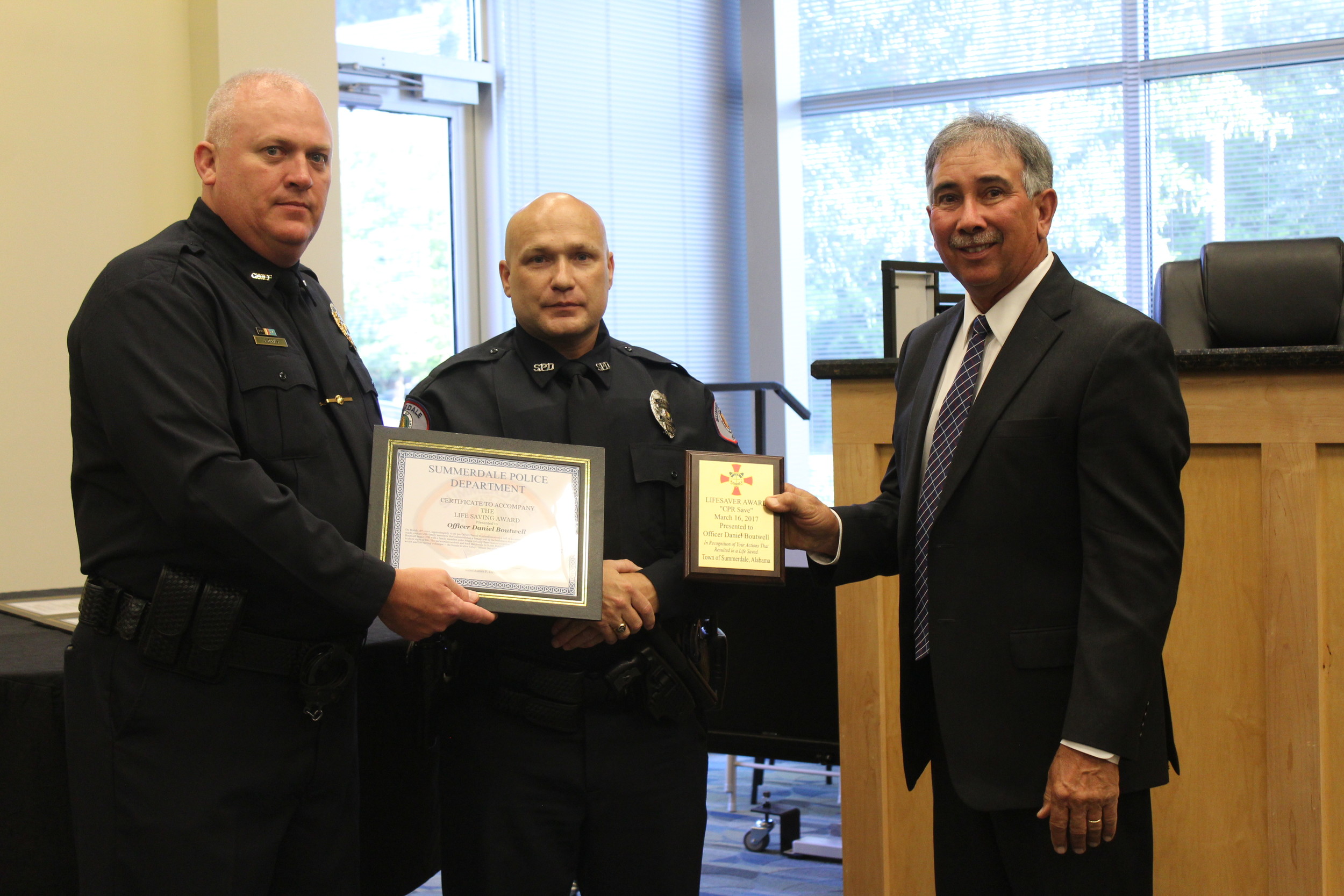 Officer Daniel Boutwell with the Summerdale Police Department received one of three lifesaving awards at the Summerdale Town Council meeting on April 10.