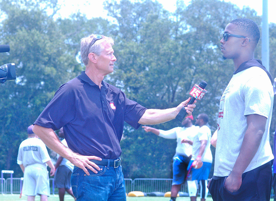 Jacksonville Jaguars running back T.J. Yeldon being interviewed Saturday by Lance Crawford, WMPI Sports Director at Al Trione Park.