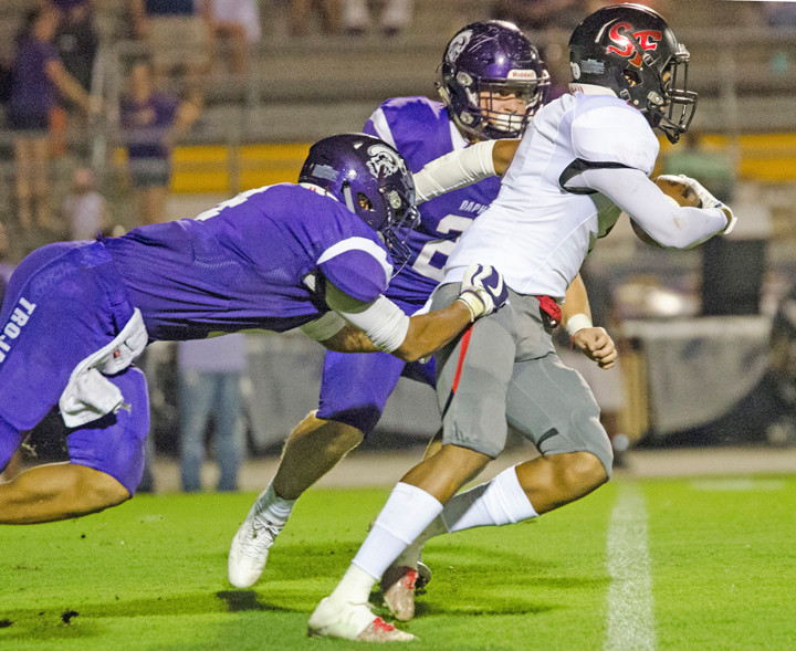 Toro sophomore Kris Abrams-Draine fights for extra yards at the end of a run against the rival Daphne Trojans on Sept. 1, 2017, at Jubilee Stadium. Now a junior with the Missouri Tigers, his 13 total passes defended through seven games lead the nation as Abrams-Draine was named a midseason All-American.