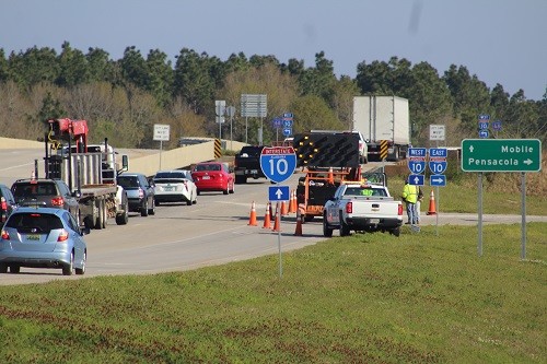 The eastbound exit onto Interstate 10 was blocked Tuesday morning at the Baldwin Beach Express. Both the eastbound and westbound lanes were blocked nearly all day Tuesday after a bus crash in the early morning hours resulted in several injuries and one death.