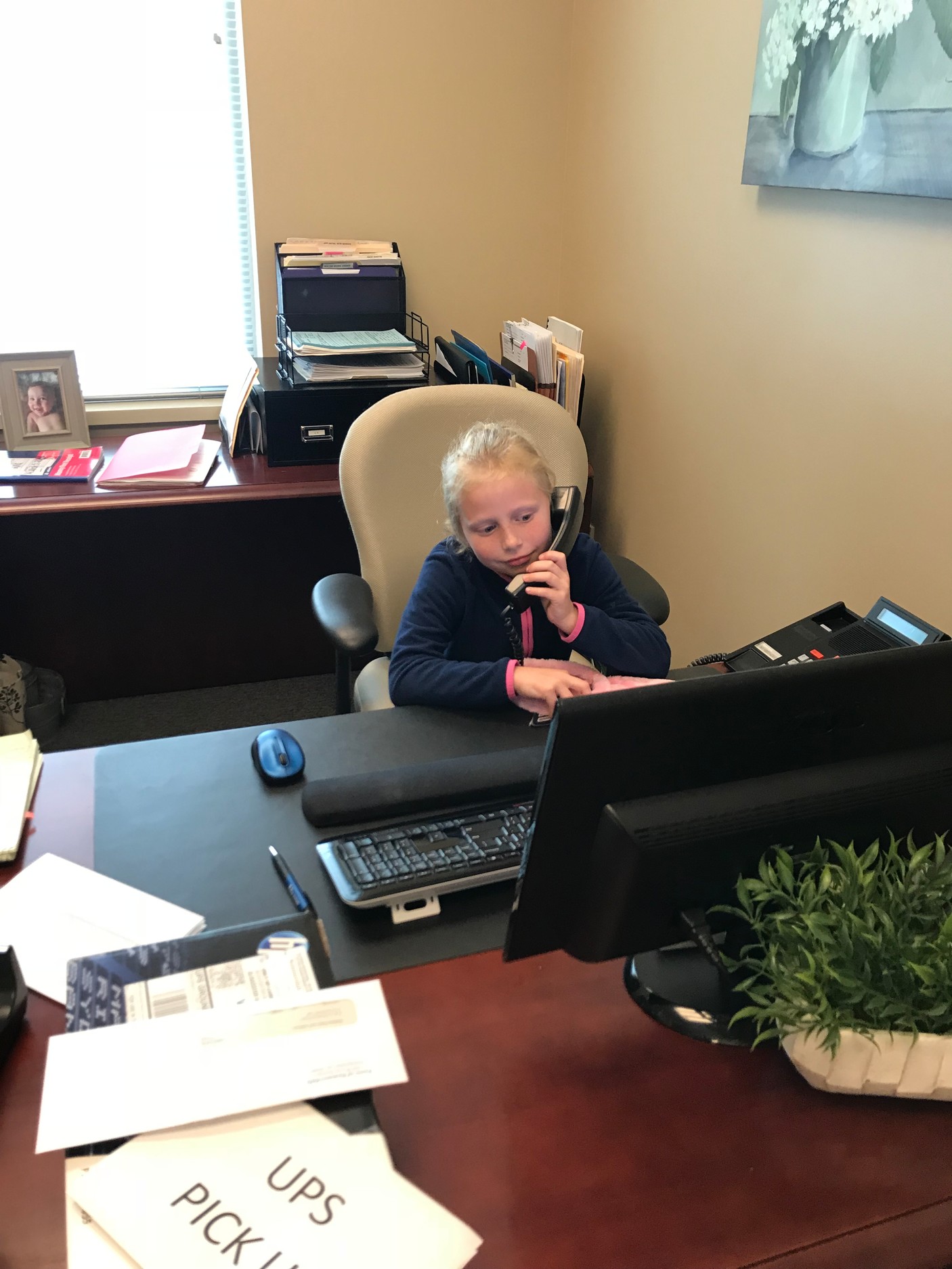 Mayor for the Day Rylie Jones taking care of town business.