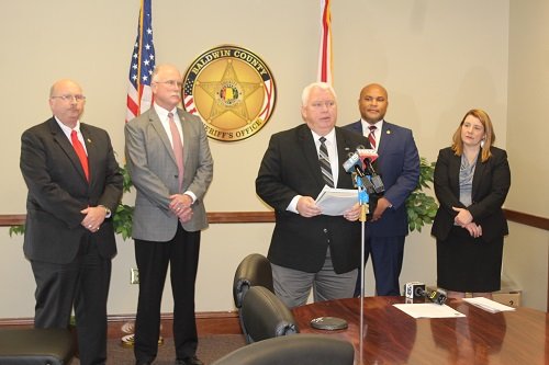 The Major Crimes Unit of Baldwin County held a press conference Thursday, Feb. 14 in the Baldwin County Sheriff's office at the Central Annex II in Robertsdale. Pictured are, from left, Sheriff Huey "Hoss" Mack Jr. District Attorney Robert Wilters, Foley Police Chief David Wilson, chairman of the MCU Board of Directors; MCU Commander Lt. Andre Reid, and assistant District Attorney Theresa Heinz.