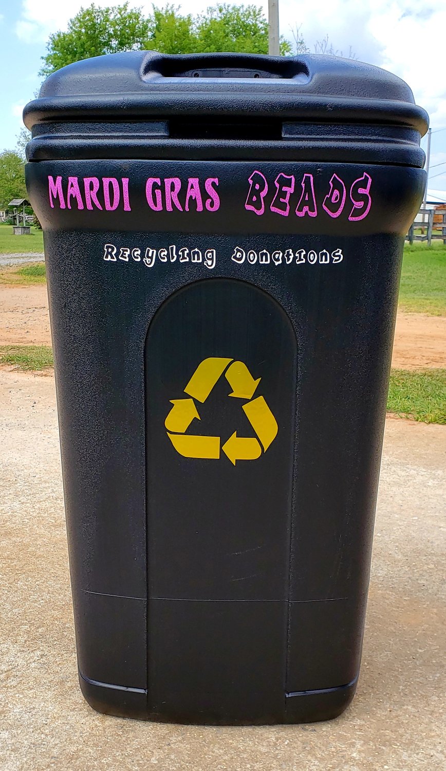Look for the Mardi Gras throw recycling bins around town!