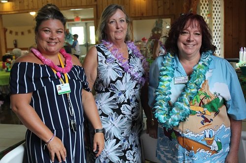 Representing sponsors are, from left, Kyla Gaston, ProHealth Home Health; Sue Alford and Shari Ballinger, Homecare Companions. Other sponsors were Alabama Hospice Care, Kindred Hospice, Community Hospice, Springhill Home Health & Hospice and Walmart.