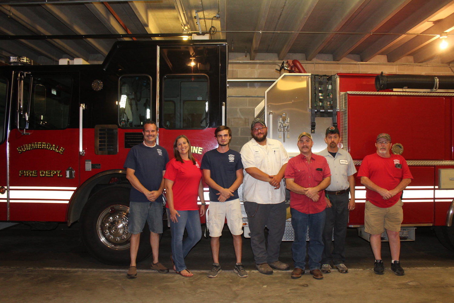 From left to right: Interim Assistant Chief Derrick Givens; Tiffany Givens; Derek Cutts; Reece Amelotte; Lane Clemons; Kenny Johnson; and Interim Chief Woody Kicklighter.