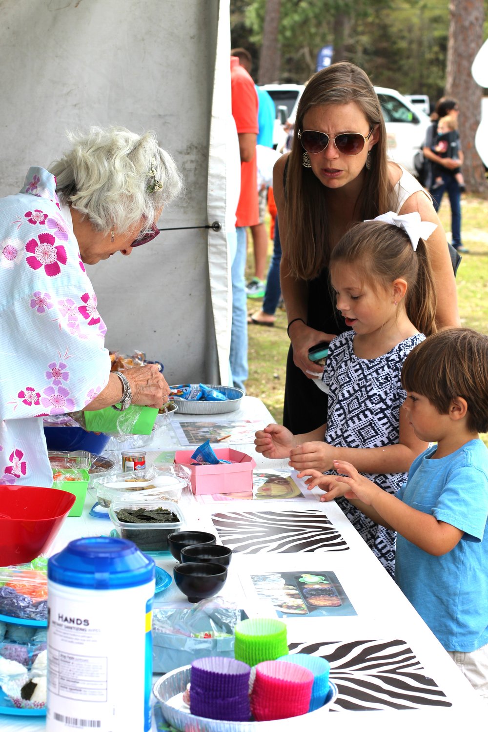 Kids' Art Alley offers young festival goers plenty of hands-on fun. Children can dig their fingers into clay, make sand art, enjoy games, watch live demonstrations and take home their own works of art.