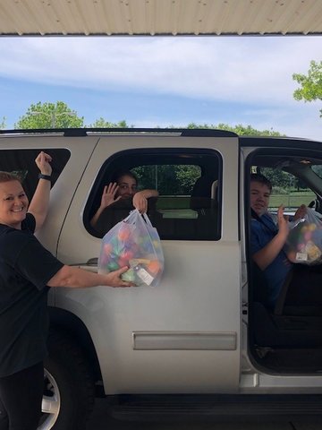 Food and Easter eggs given out by drive thru