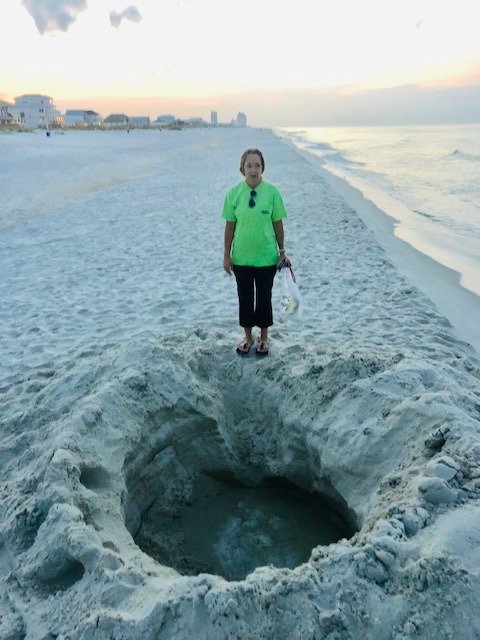 Digging holes on the beach and leaving them is dangerous for nesting sea turtles and humans. Please remember to fill all holes before leaving the beach.
