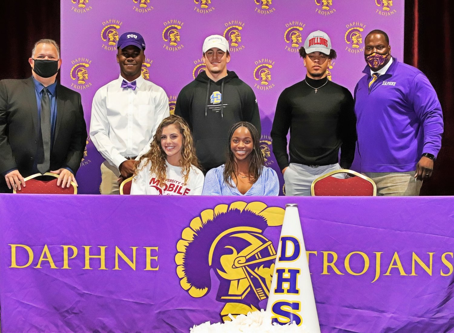The signing-day honorees with Daphne Mayor Robin LeJuene and DHS Athletic Director/Head football coach Kenny King.