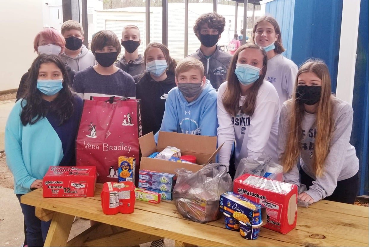 The Peer Helpers of Gulf Shores Middle School collected items to be placed in boxes around the area.