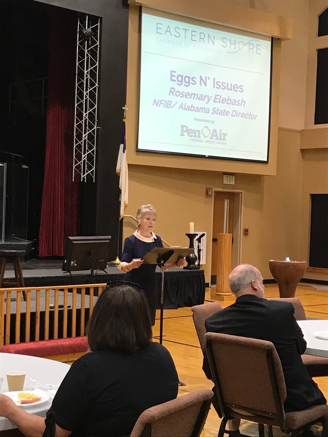 Rosemary Elebash, Alabama director of the National Federation of Independent Businesses, addresses the March Eggs and Issues meeting of the Eastern Shore Chamber of Commerce.