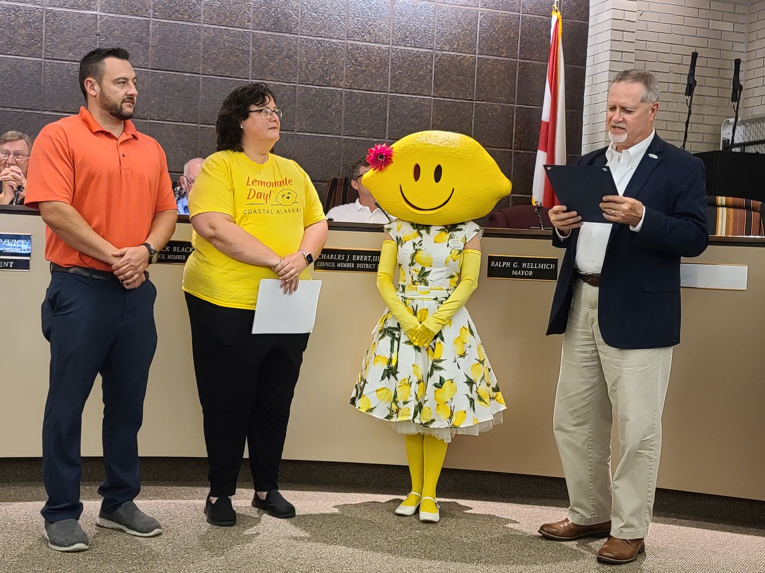 From left, South Baldwin Chamber Vice President of Investor Relations Travis Valentine, Coastal Alabama Business Chamber VP of Education & Programs Penny Hughey, Lemonade Day Mascot Zesty, and Foley Mayor Ralph Hellmich.