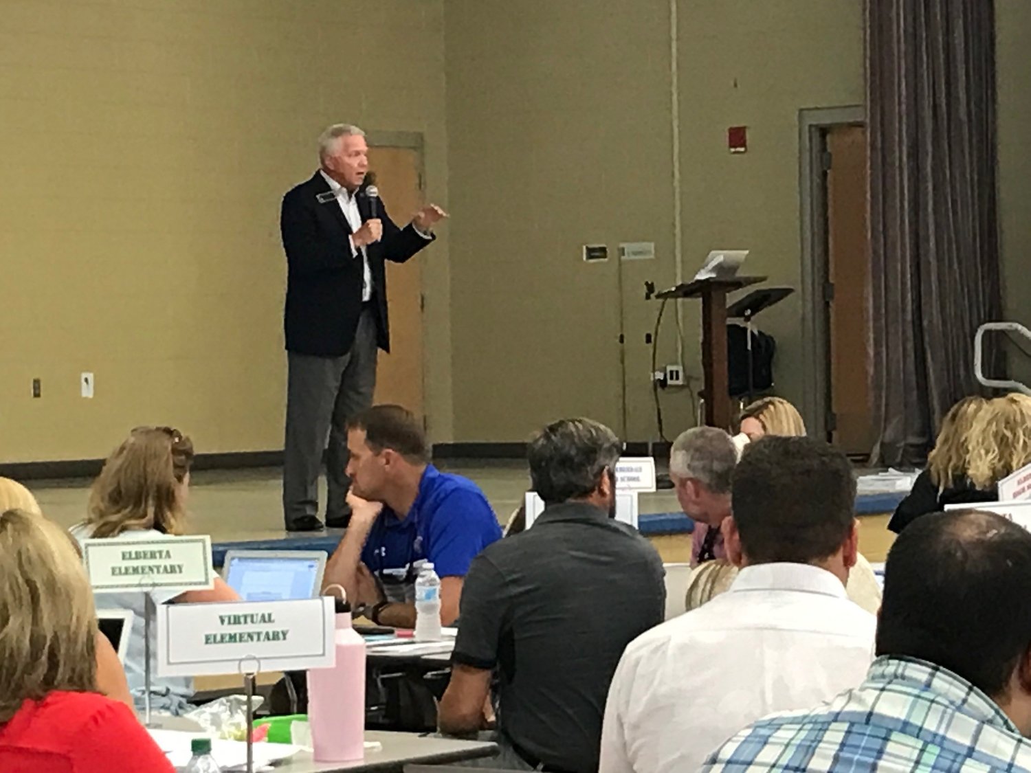 Eddie Tyler, Baldwin County superintendent of education, speaks to school system administrators at Fairhope Middle School on July 22. Tyler said schools will reopen Aug. 11 without mask requirements.