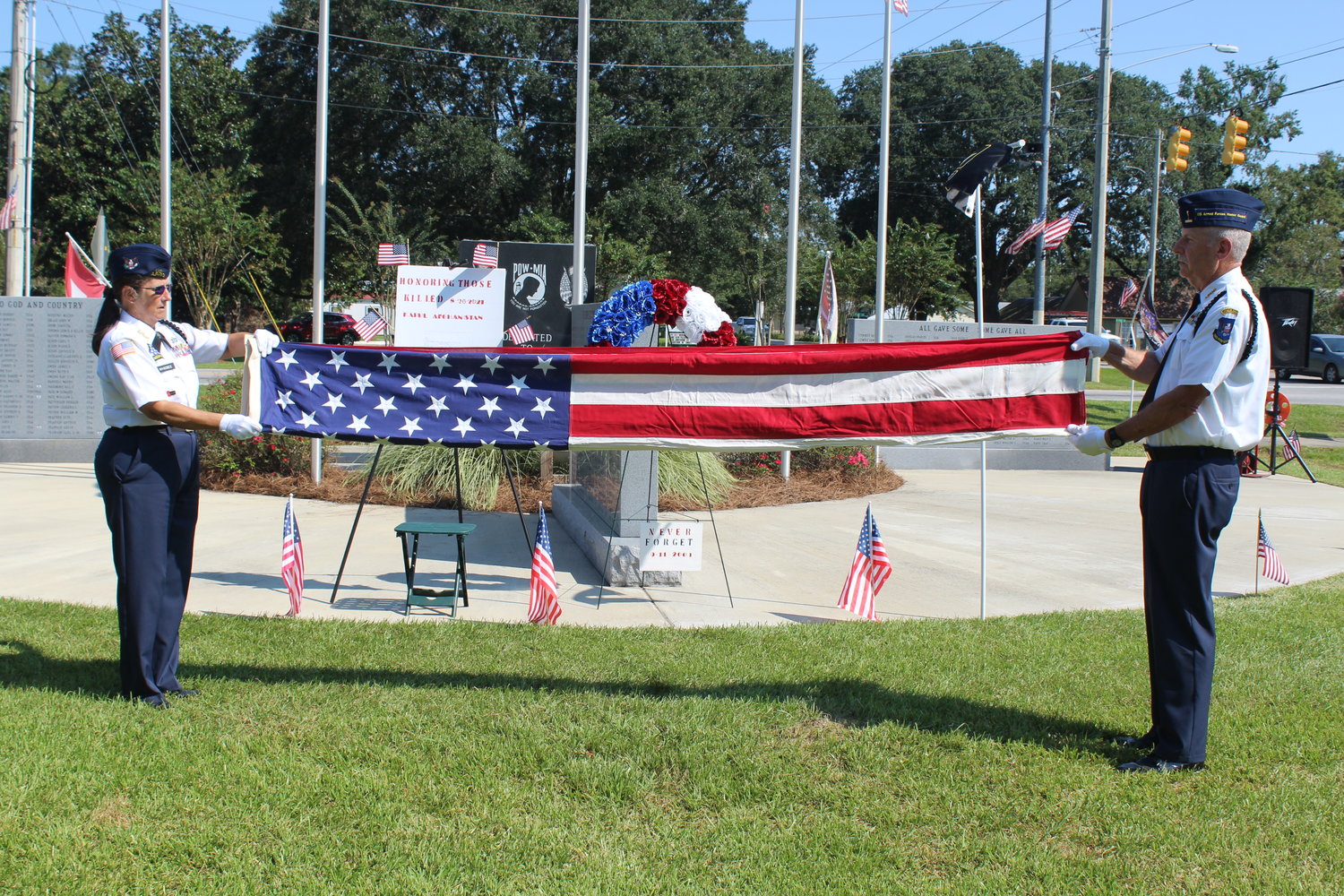 Flag folding ceremony by the U.S. Armed Forces Honor Guard of Baldwin County.