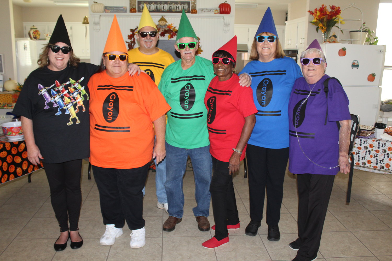 Robertsdale senior staff and volunteers dressed as crayons, from left, senior activities director Amy Ochello, volunteer coordinator Mary Williams, Lee Day, Alvin Nabors, Georgia Rudolph, Mary Nabors and Kathy Peterson.
