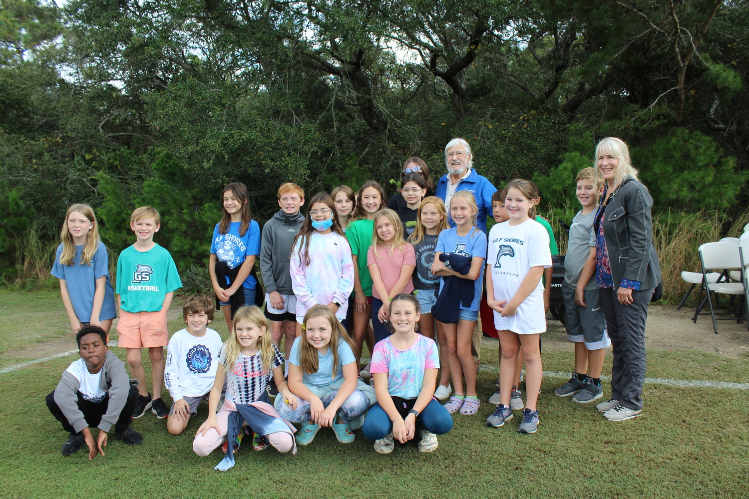 Jean-Michele Cousteau toured the site for the Gulf Coast Eco Center with students during the ground saving event. Students collects reindeer moss and other native plants that will be cared for until being replanted after construction is complete.