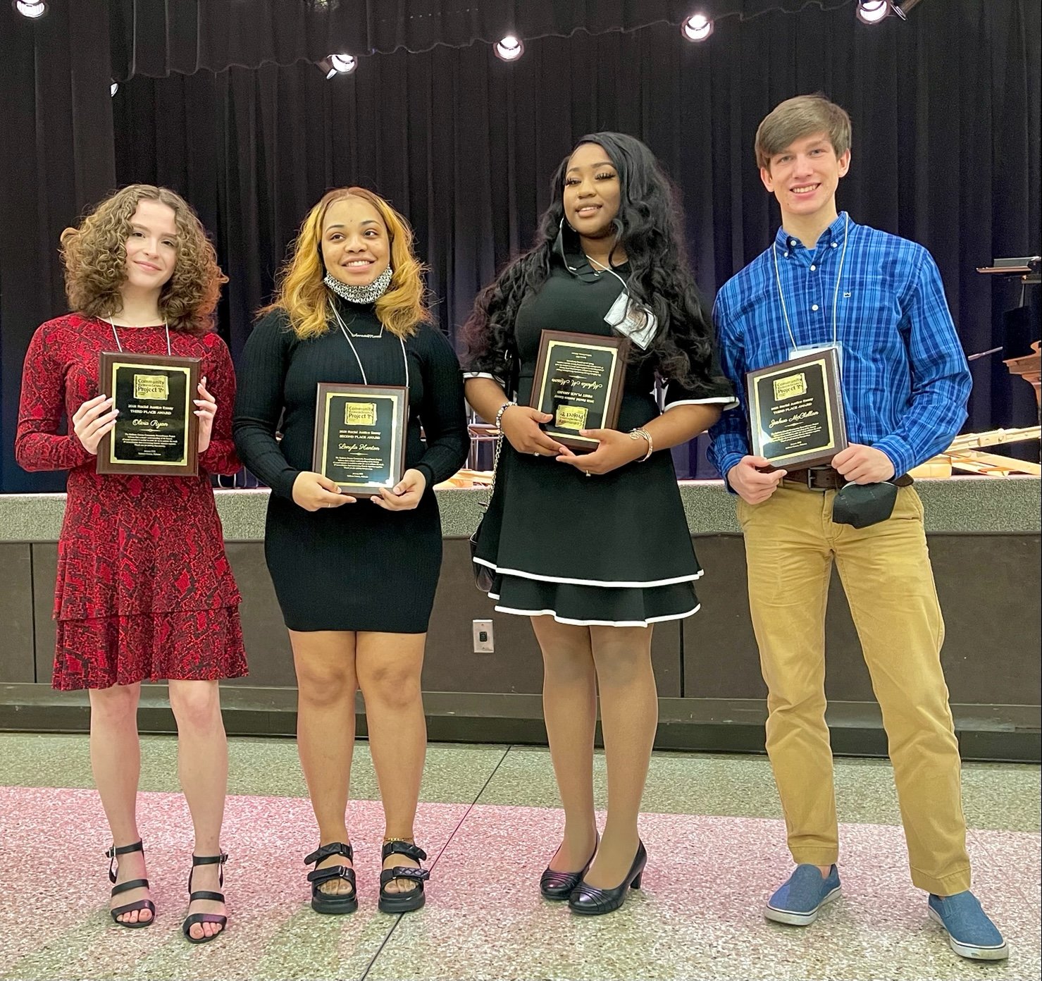 The 2022 Dr. Martin Luther King Day Celebration was held in Foley on Monday, Jan. 17. Winners of the Baldwin County Racial Justice Essay Contest were announced during the event. Students receiving top honors and scholarship awards include (from left) Robertsdale High School 10th grader Olivia Ryan in 3rd place ($750); Foley High School 12th grader Lonyla Henton in 2nd place ($1,500); Daphne High School 11th grader Mykala M. Mason in 1st place ($2,000); and Spanish Fort High School 12th grader Joshua McClellan in 3rd place ($750).