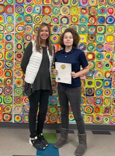 J. Larry Newton Principal Patrice Wolfe and John Mellow. Mellow received an Honorable Mention in the elementary division.