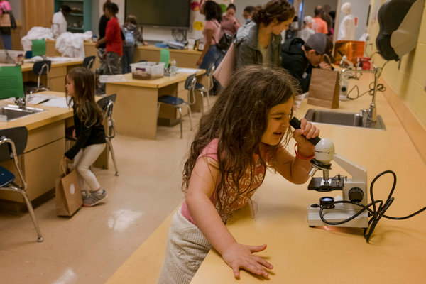 Students and their families use one of Foley Elementary's STEAM labs during the school's first STEAM night.