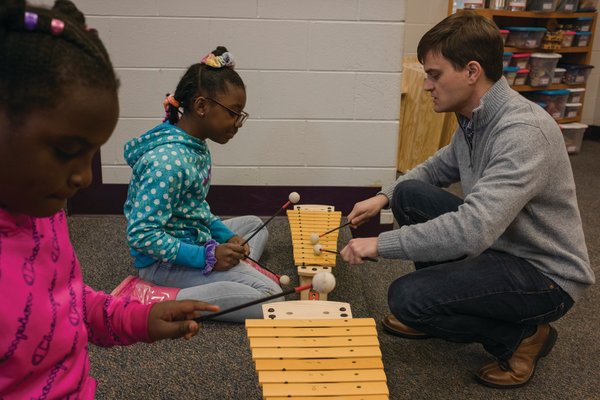 Jason Jackson helps a student with her xylophone during class on Friday.

“My favorite thing about Orff Ensemble is getting to play with your friends and learning about each instrument.” - Rylee Snider, Orff Ensemble member