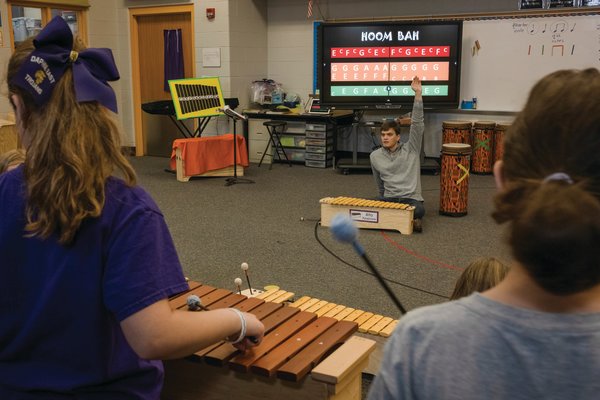 Jason Jackson goes over a song before rehearsing it on xylophones with his class on Friday.

"I love Orff because you can learn to play different instruments, and make new friends, and learn to play new pieces of music." - Madison Dumas, Orff Ensemble member