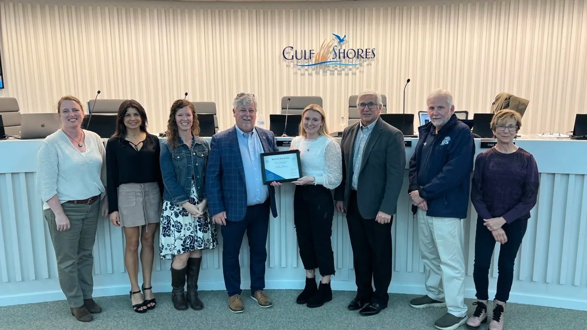 Pictured here, from left: Board Vice President Nicky Gotschall, Assistant Superintendent Dr. Stephanie Harrison, Board Member Kelly Walker, Superintendent Dr. Matt Akin, WaveMaker recipient Violet Adams, Board President Kevin Corcoran, Board Member Frank Malone and Board Member Dale Jernigan.